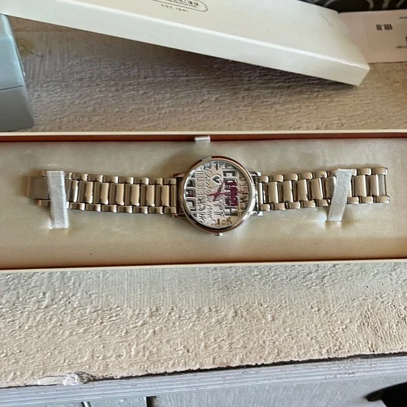 Coach | Accessories | Coach Poppy Silver Watch | Poshmark display picture 1